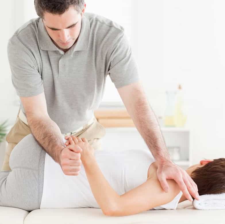 a chiropractor doing adjustments