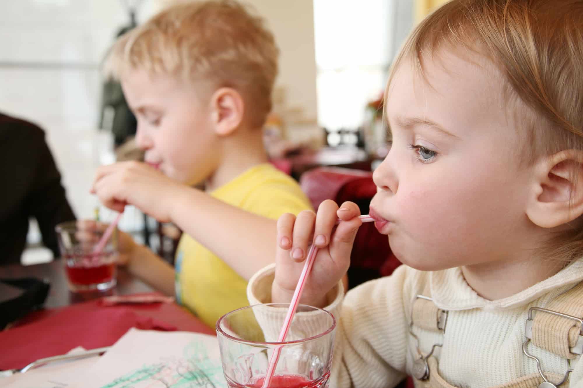 children drinking juice