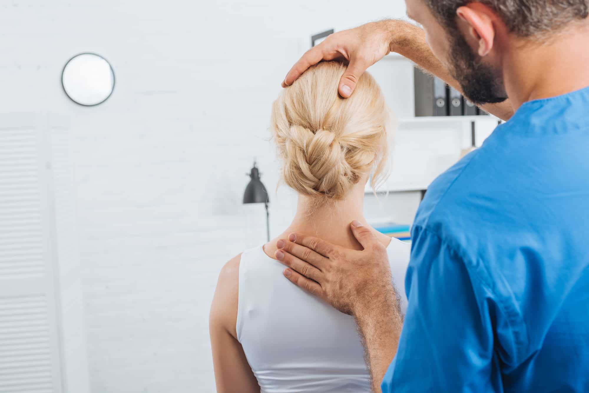 chiropractor adjustment to address stiff neck