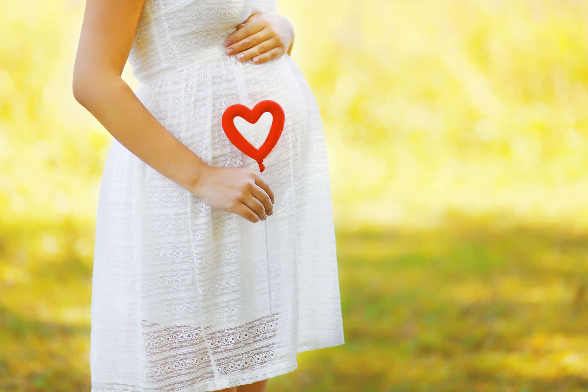 A pregnant woman in the park