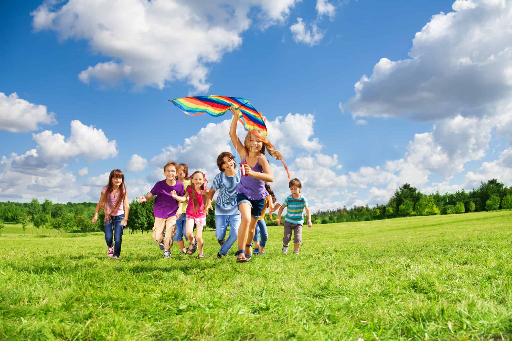 Kids are having a great time playing kite