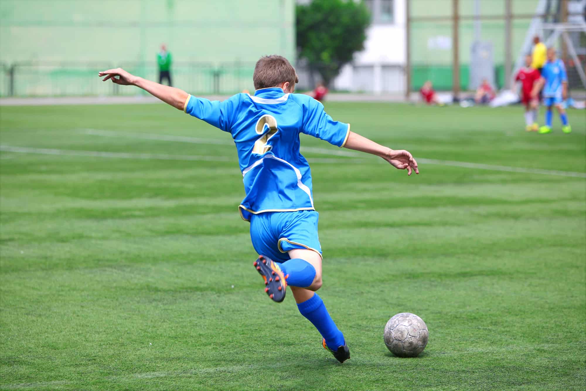 a young man playing football