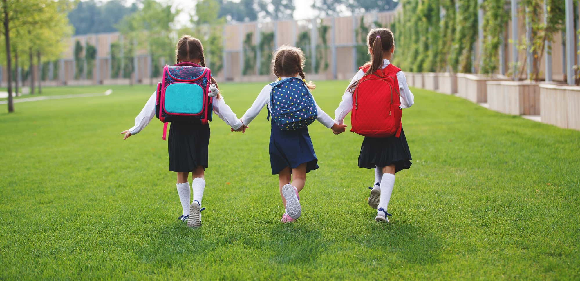 Happy children going back to school