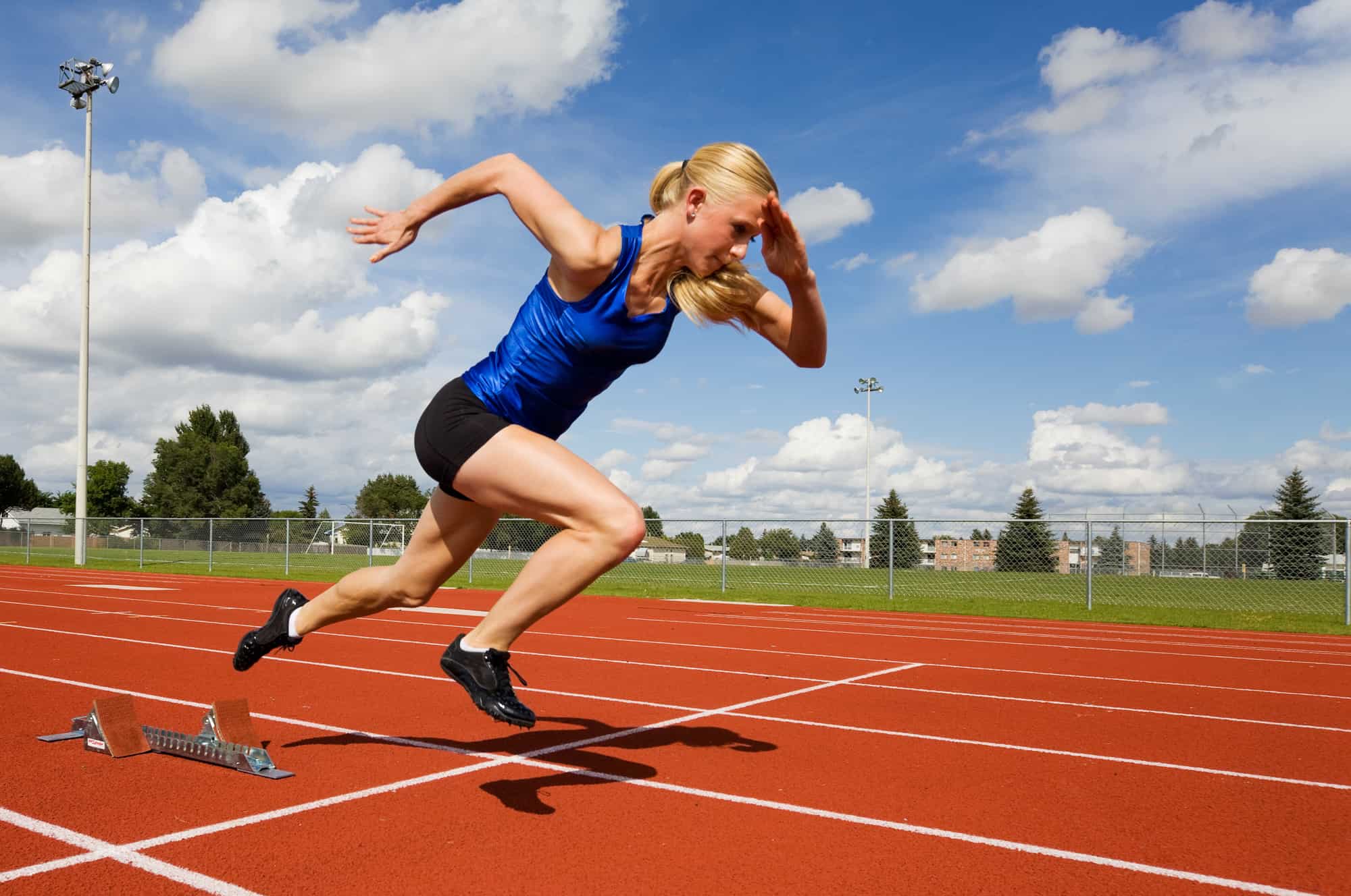 A female athlete on the racing track.