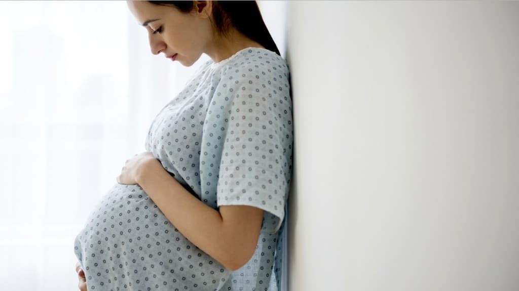 A pregnant woman at the chiropractic care office