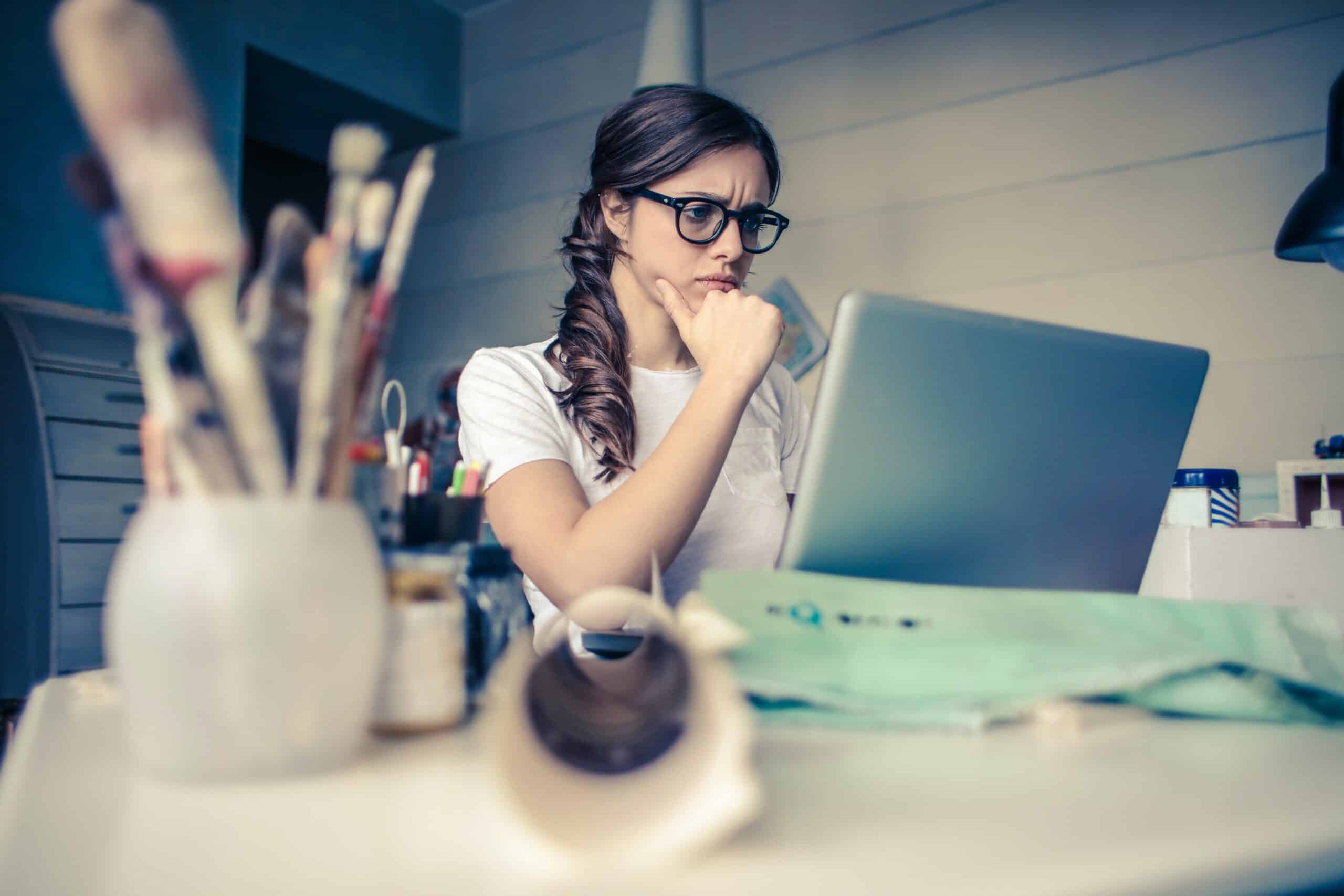 A woman feeling stressed at work