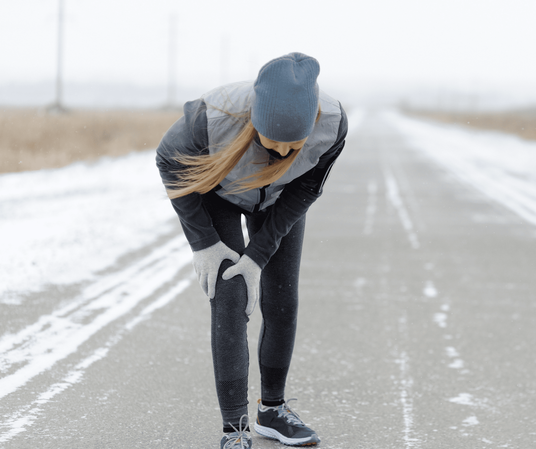 A woman experiencing injuries caused by winter conditions