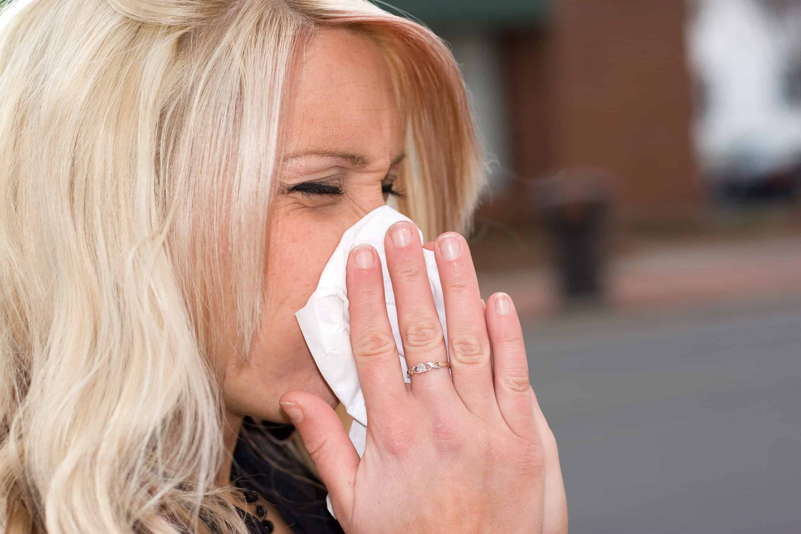 a woman suffering from allergy