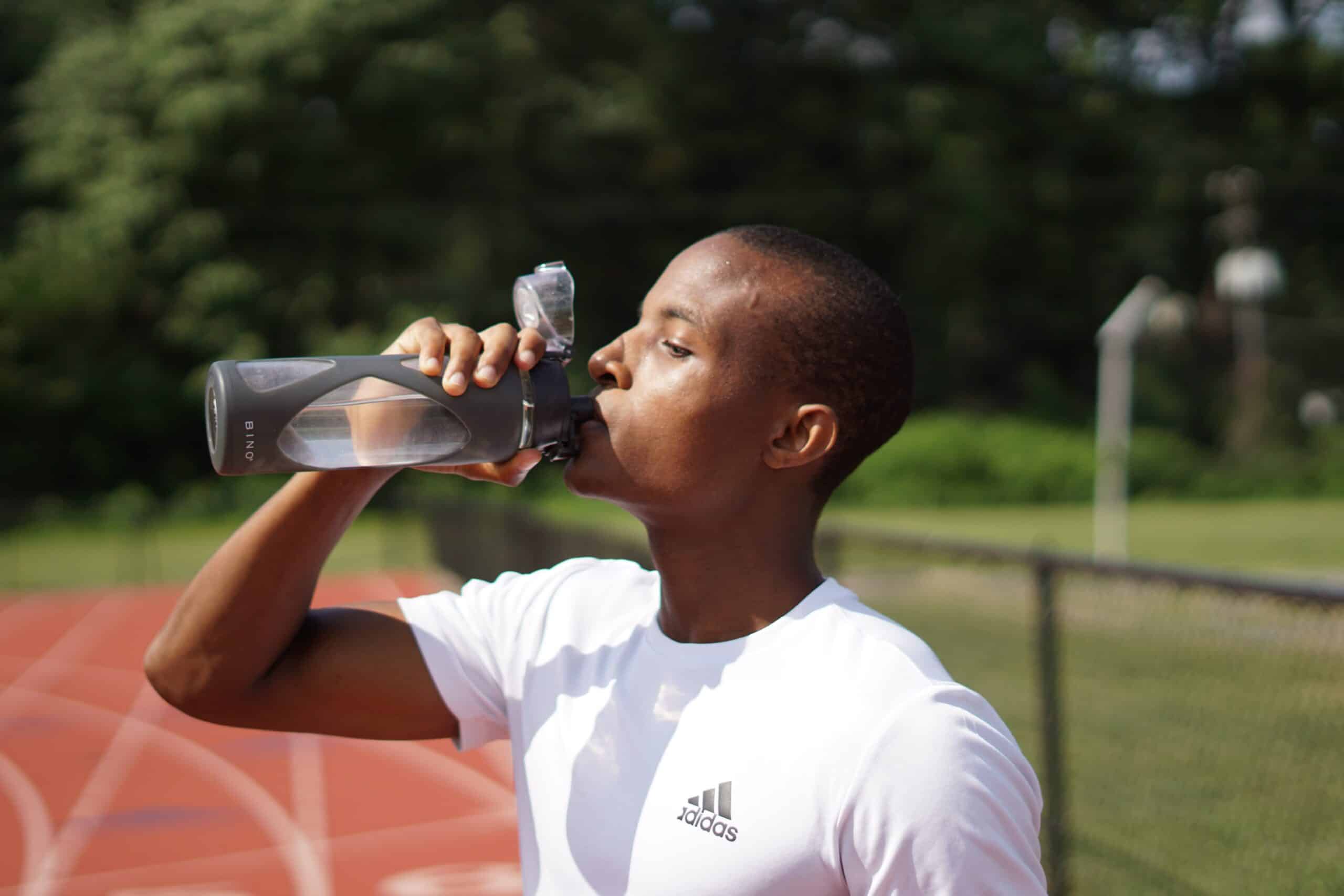 An athlete drinking water.