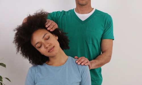 Neck adjustment at the chiropractic office